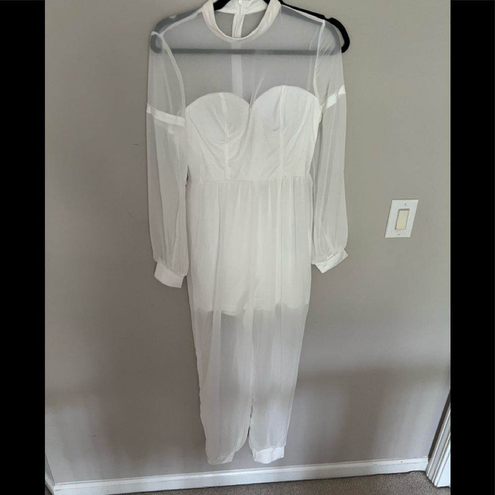 Just in time for all the summer white parties! never worn white jumpsuit …